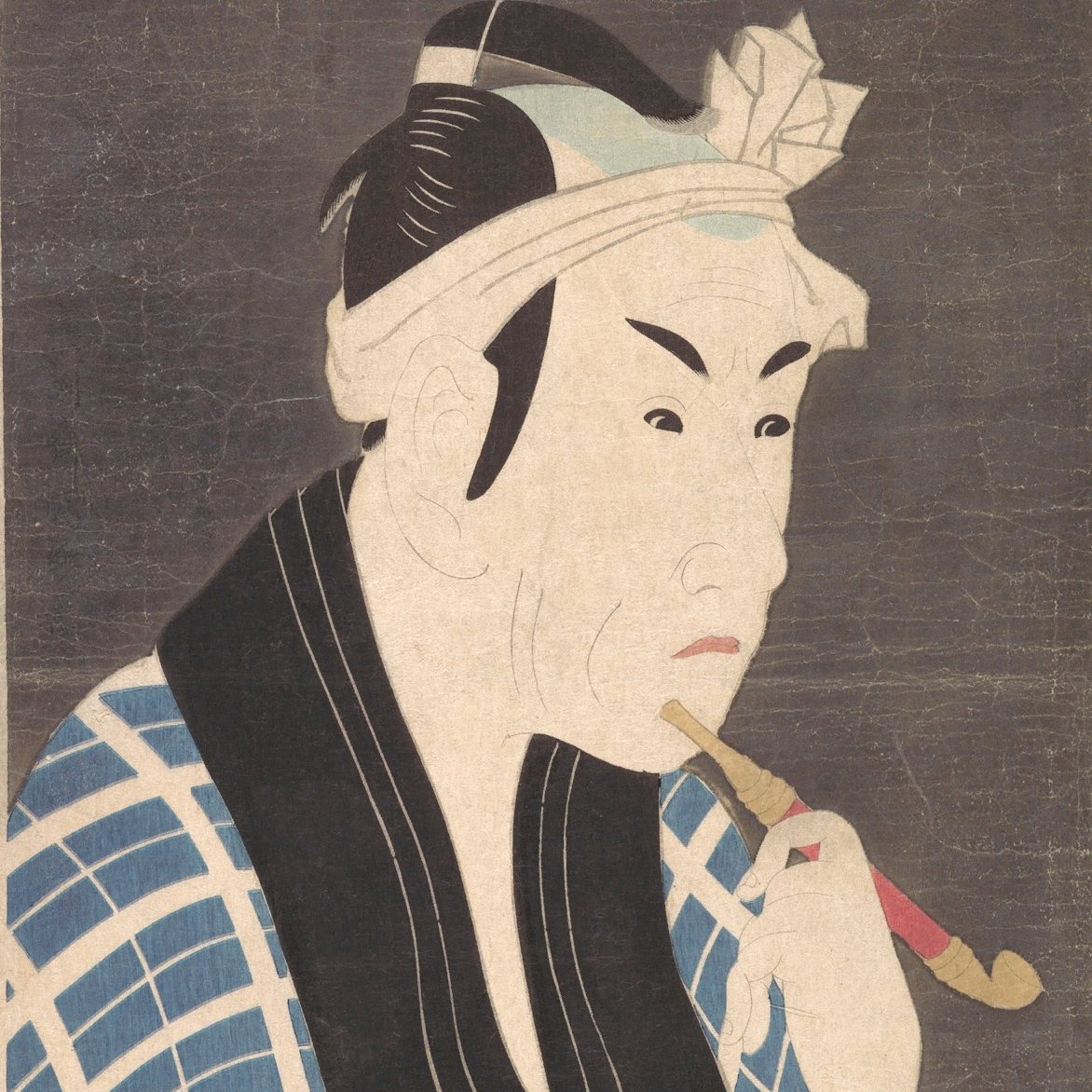 Японец с трубкой кисэру