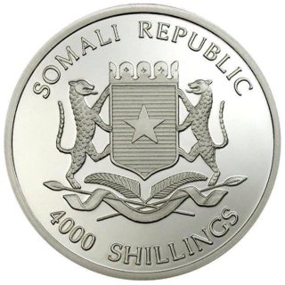 Монета Сомали, посвященная трем обезьянам, серебро, 2006 г. Гербовая сторона